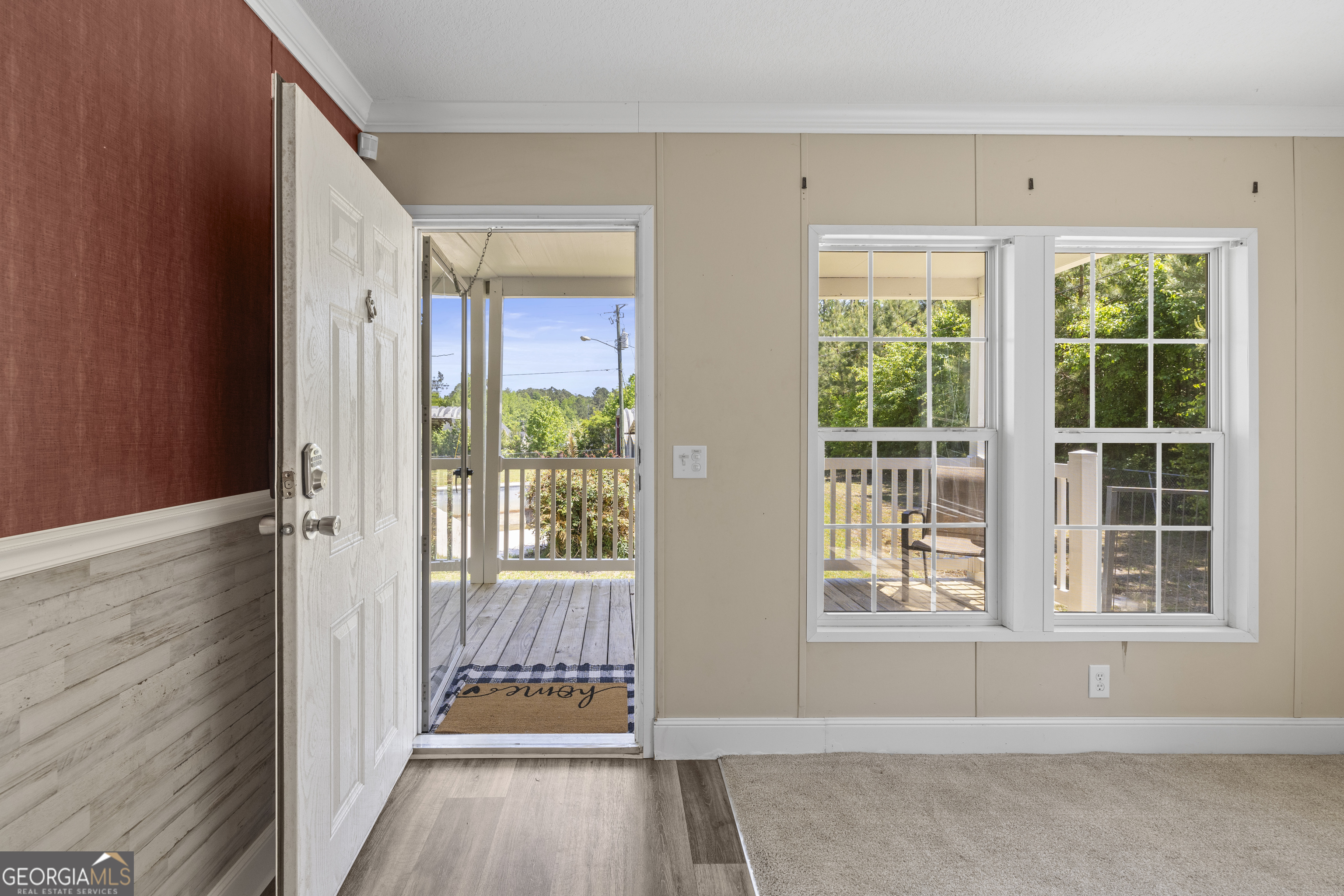 1173 Highway 21 Springfield, GA 31329 - Photo 2 of 18 a view of an entryway with wooden floor and windows