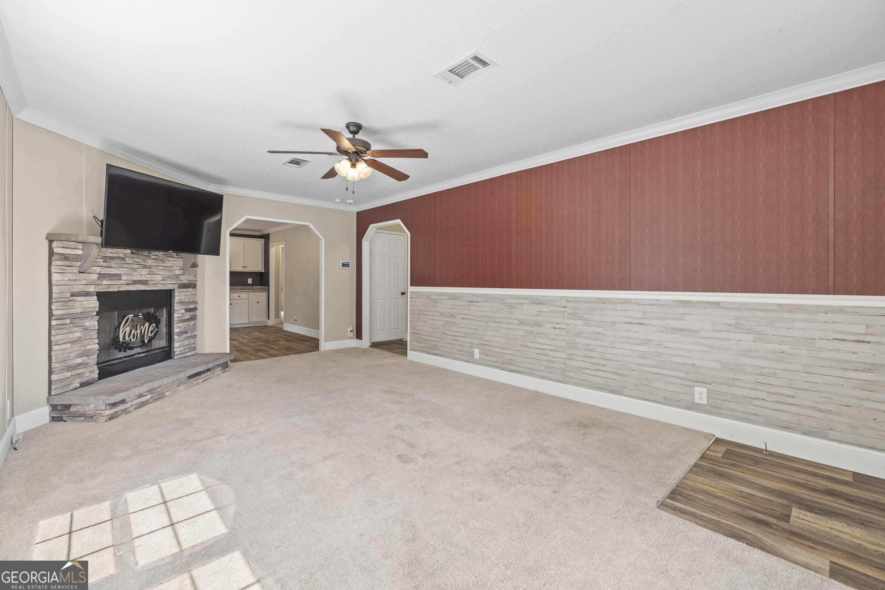 1173 Highway 21 Springfield, GA 31329 - Photo 3 of 18 a view of an empty room with a fireplace