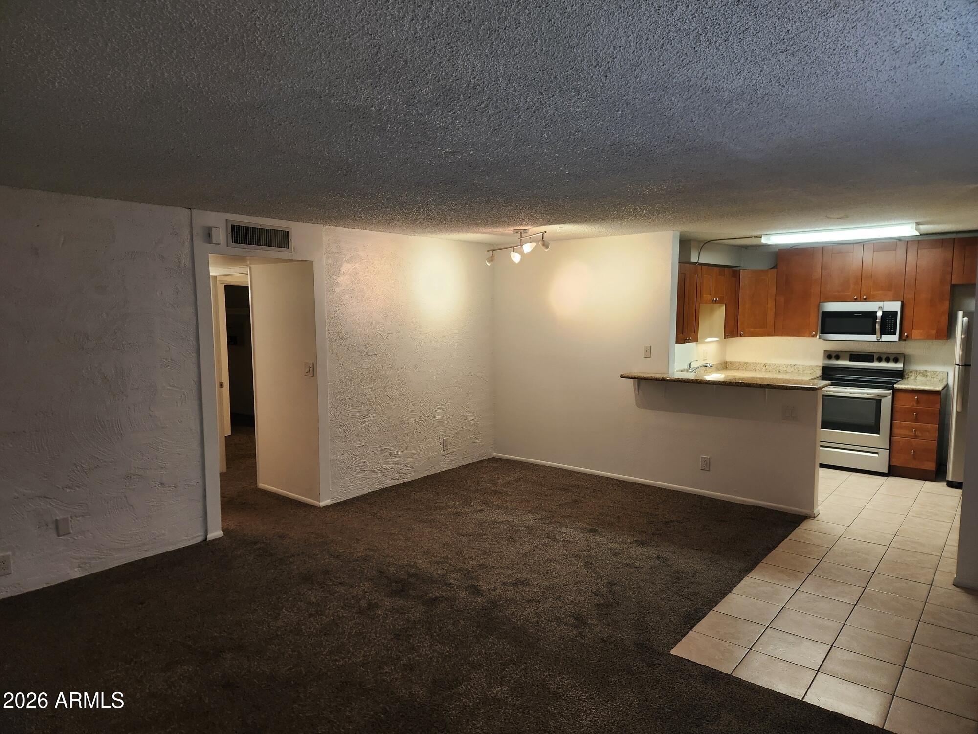 3230 East Pinchot Avenue, Unit 3 Phoenix, AZ 85018 - Photo 2 of 24 20260315_095927_resized_1