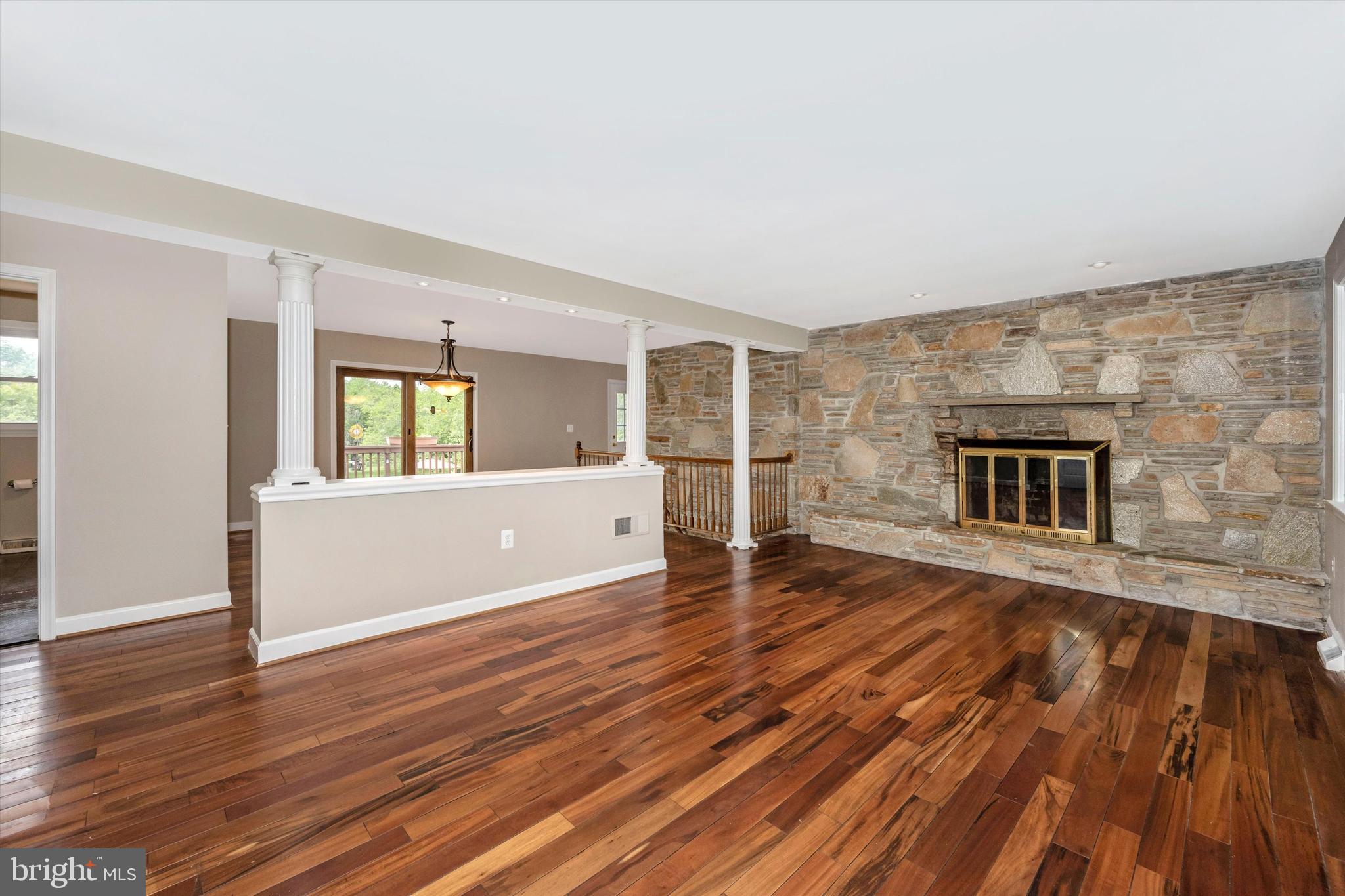 1724 Bollinger Road Westminster, MD 21157 - Photo 10 of 71 Living room with FP opens to Dining room & slider