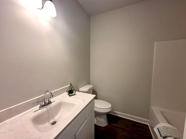 a bathroom with a sink and a toilet