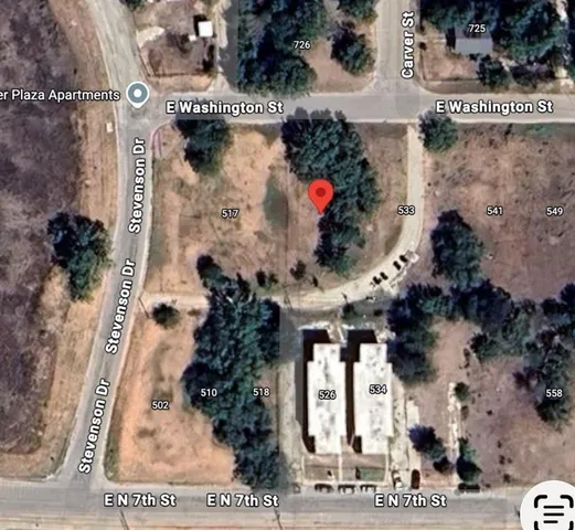 an aerial view of residential house with outdoor space