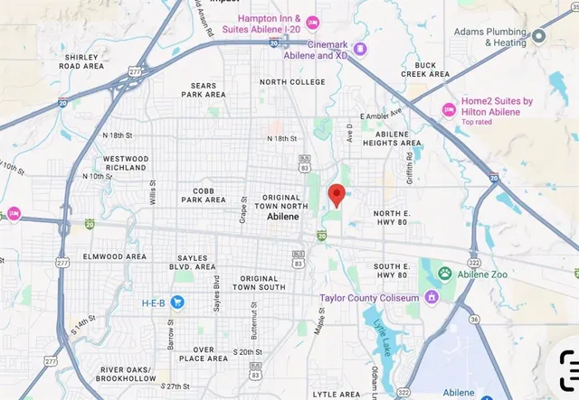 a picture of a bathroom with a window