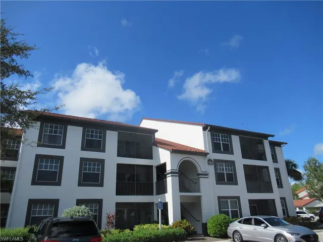 a front view of a building with balcony
