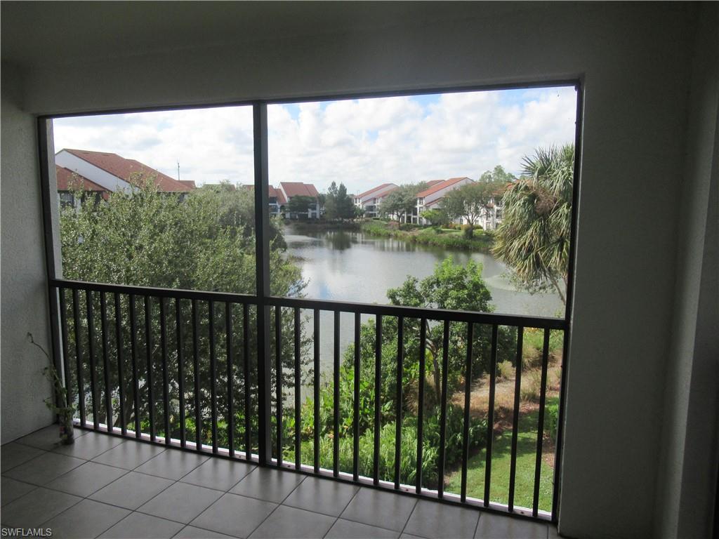 7965 Preserve Circle, Unit 732 Naples, FL 34119 - Photo 2 of 28 a city view from a balcony