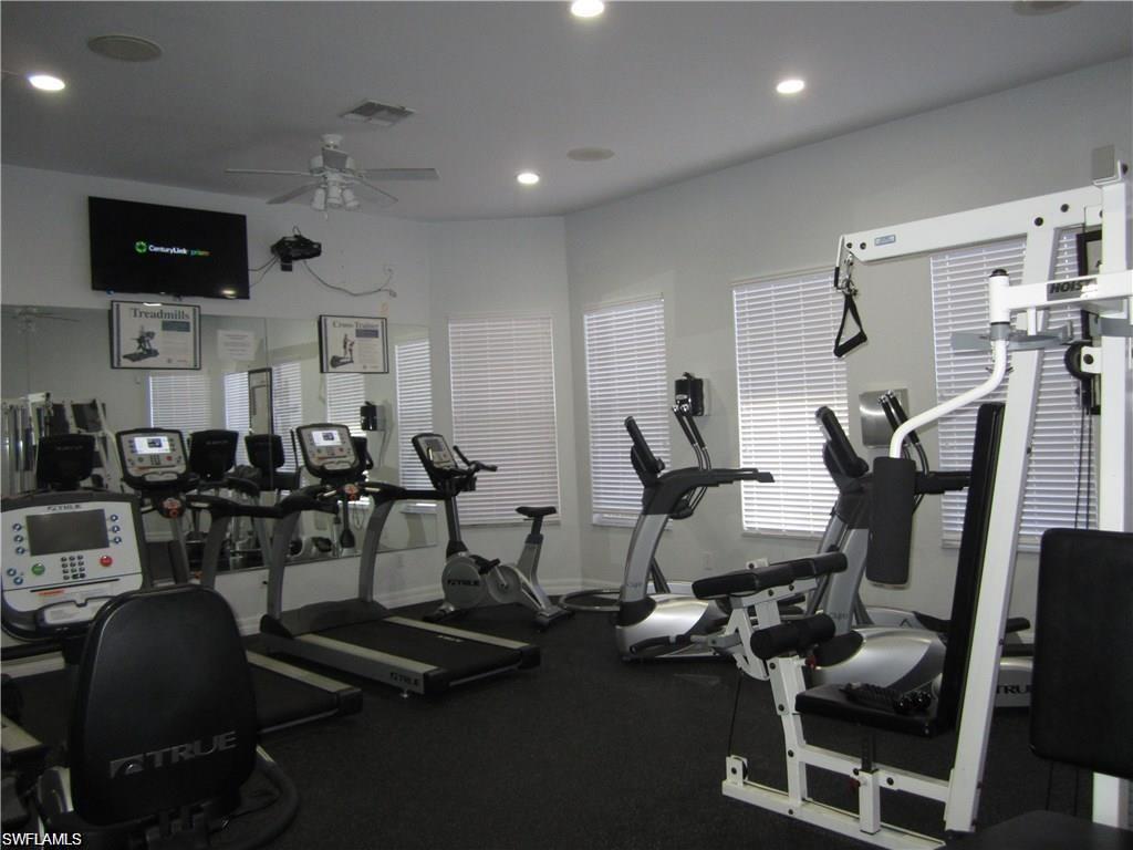 7965 Preserve Circle, Unit 732 Naples, FL 34119 - Photo 21 of 28 a view of a room with gym equipment