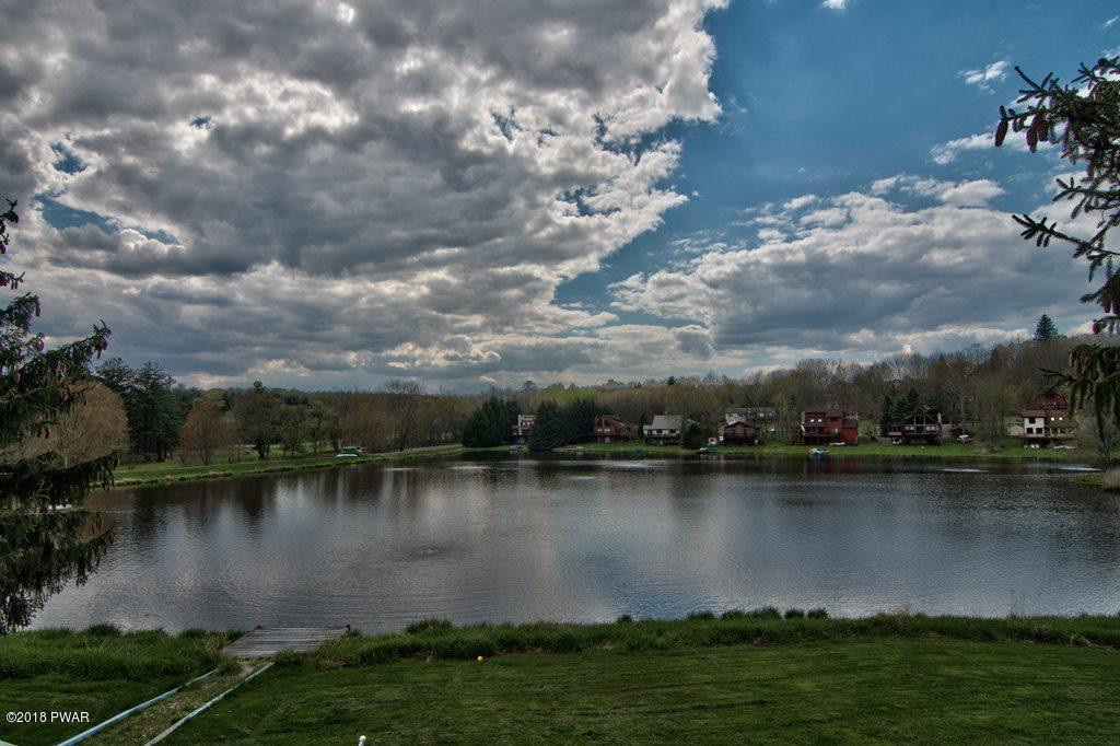 2327 Brookfield Road Lake Ariel, PA 18436 - Photo 35 of 53 a view of a lake with houses in the back