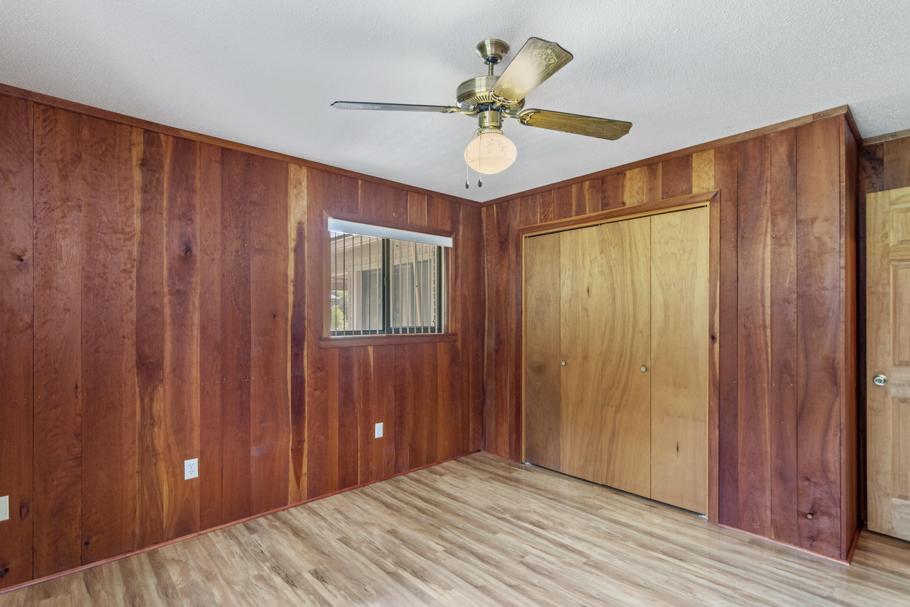 5489 Highway 4 Baker, FL 32531 - Photo 23 of 65 a view of a room with a front door and wooden floor
