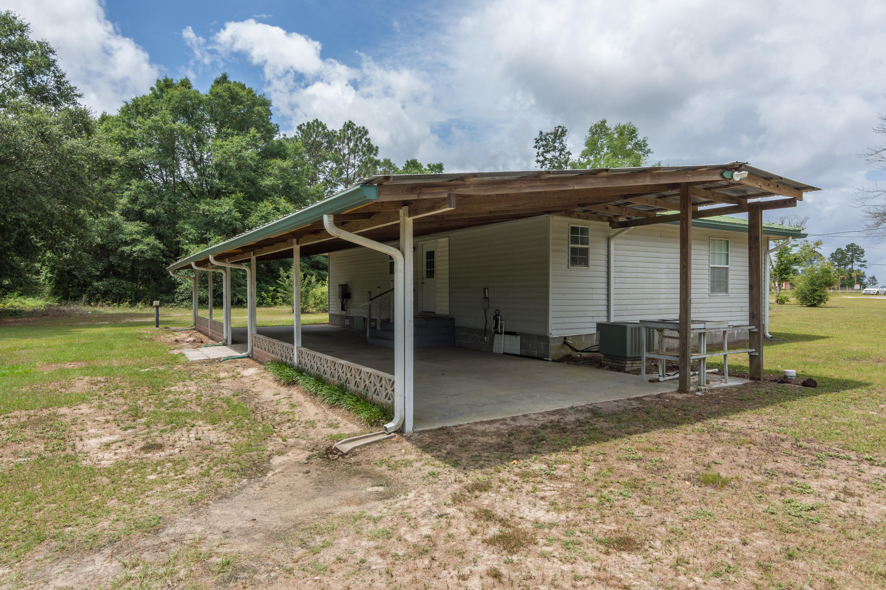 5489 Highway 4 Baker, FL 32531 - Photo 32 of 65 a view of a house with a outdoor space