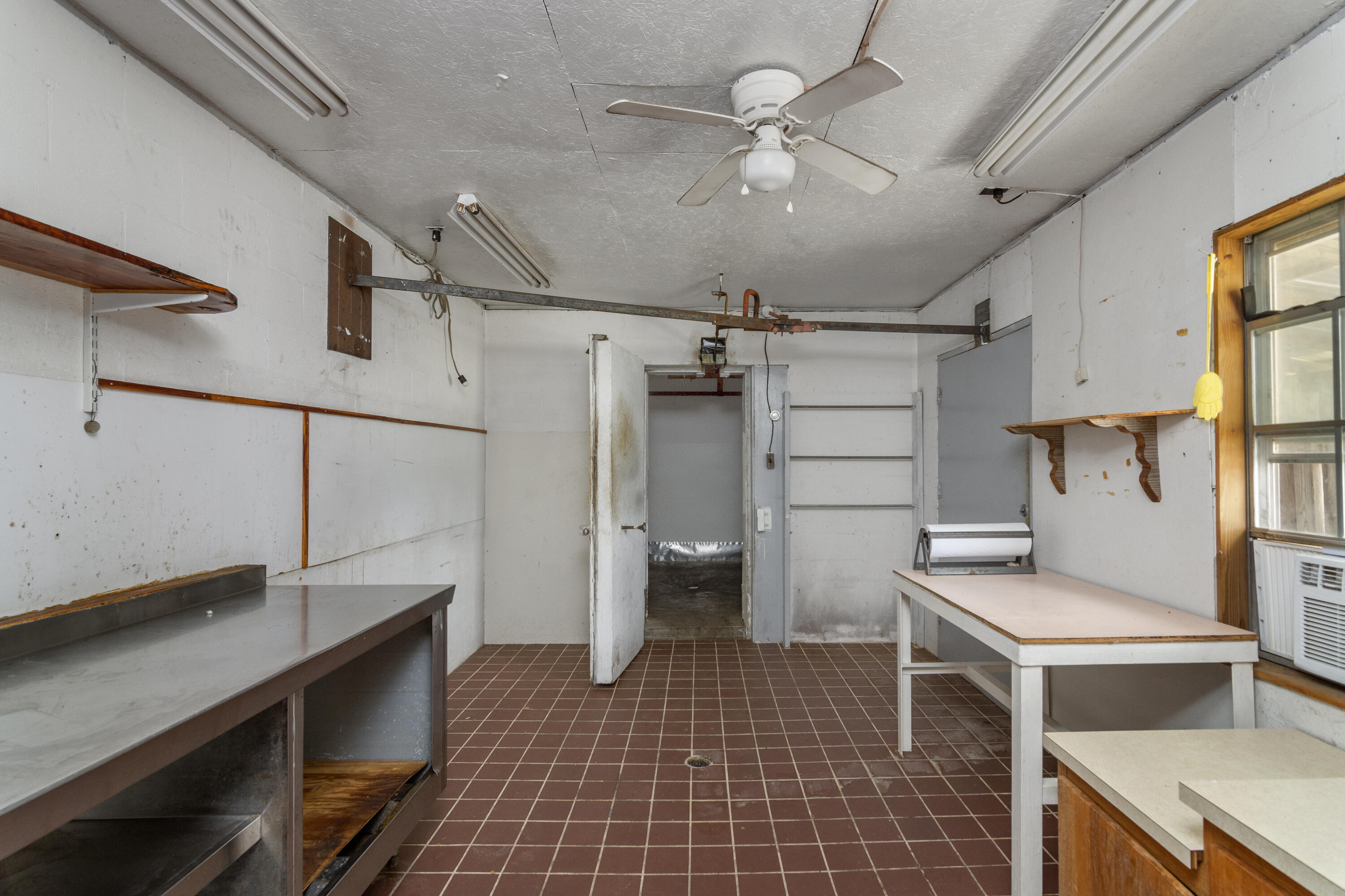 5489 Highway 4 Baker, FL 32531 - Photo 57 of 65 a kitchen with a refrigerator and a stove