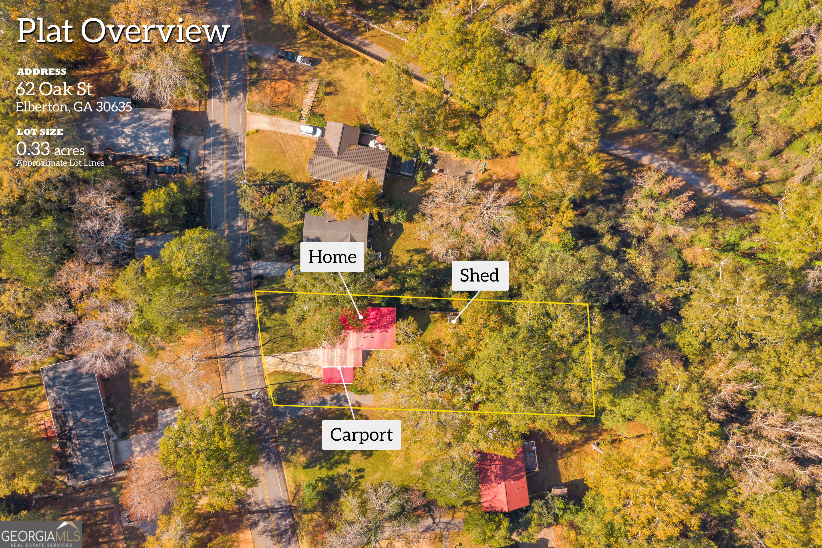 62 Oak Street Elberton, GA 30635 - Photo 2 of 48 a street sign on a wall next to a road