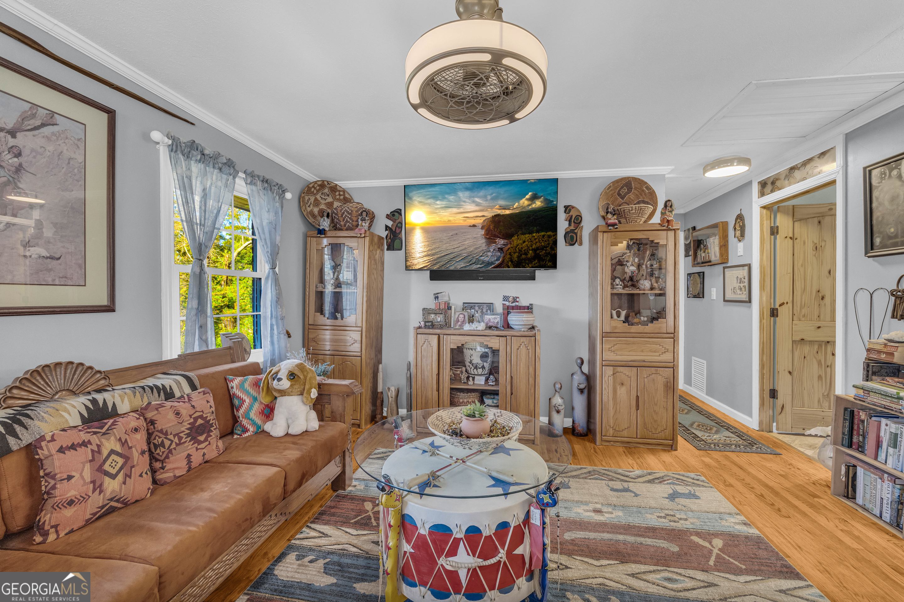 62 Oak Street Elberton, GA 30635 - Photo 23 of 48 a living room with furniture and a flat screen tv