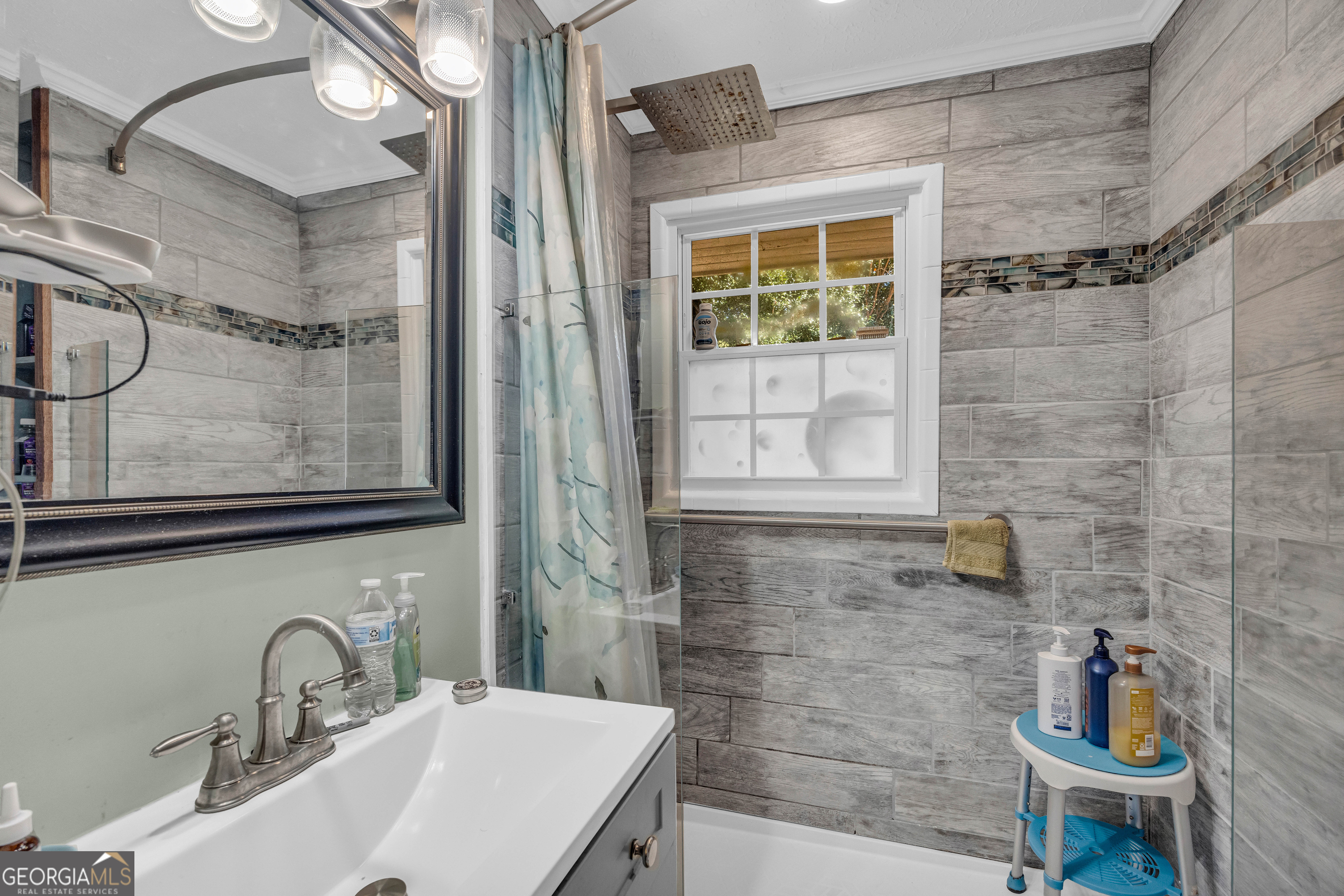 62 Oak Street Elberton, GA 30635 - Photo 30 of 48 a bathroom with a sink and a mirror