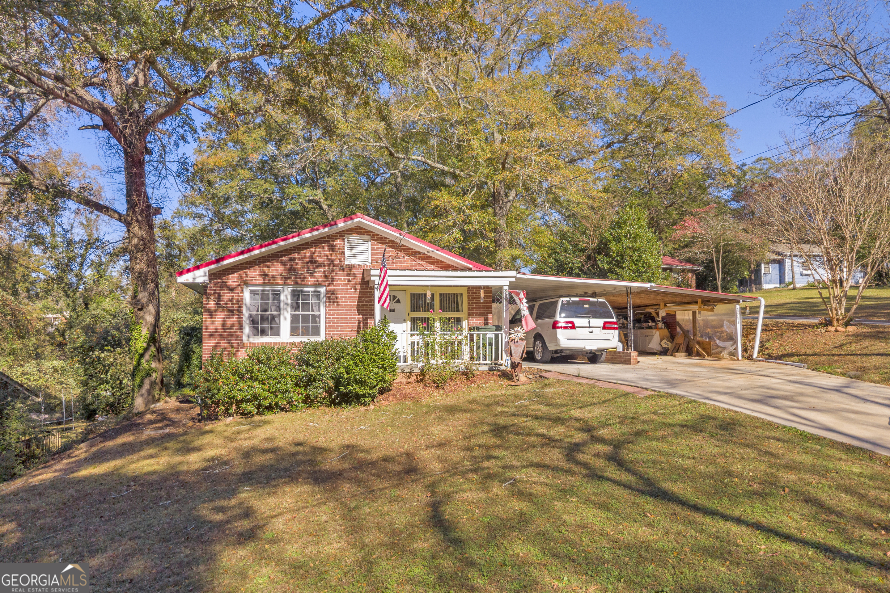 62 Oak Street Elberton, GA 30635 - Photo 3 of 48 a front view of a house with a yard