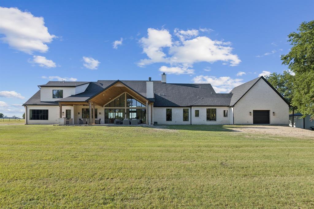 1890 McConnell Road Gunter, TX 75058 - Photo 37 of 40 a front view of a house with a yard