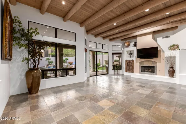 a view of empty room with windows