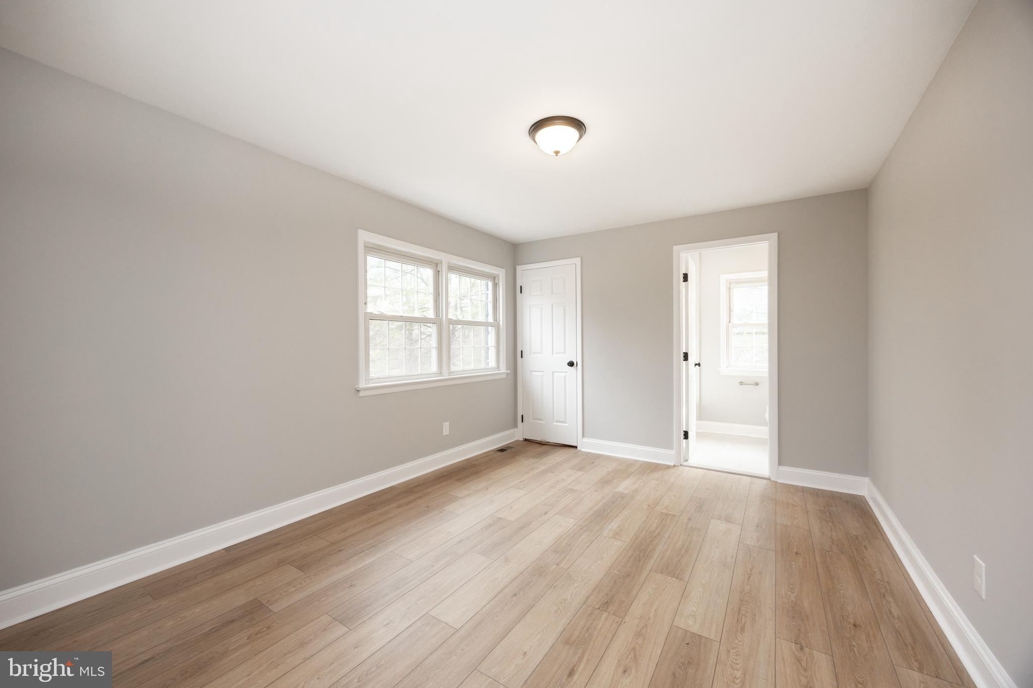 60 Buckwalter Road Royersford, PA 19468 - Photo 18 of 40 wooden floor in an empty room with a window