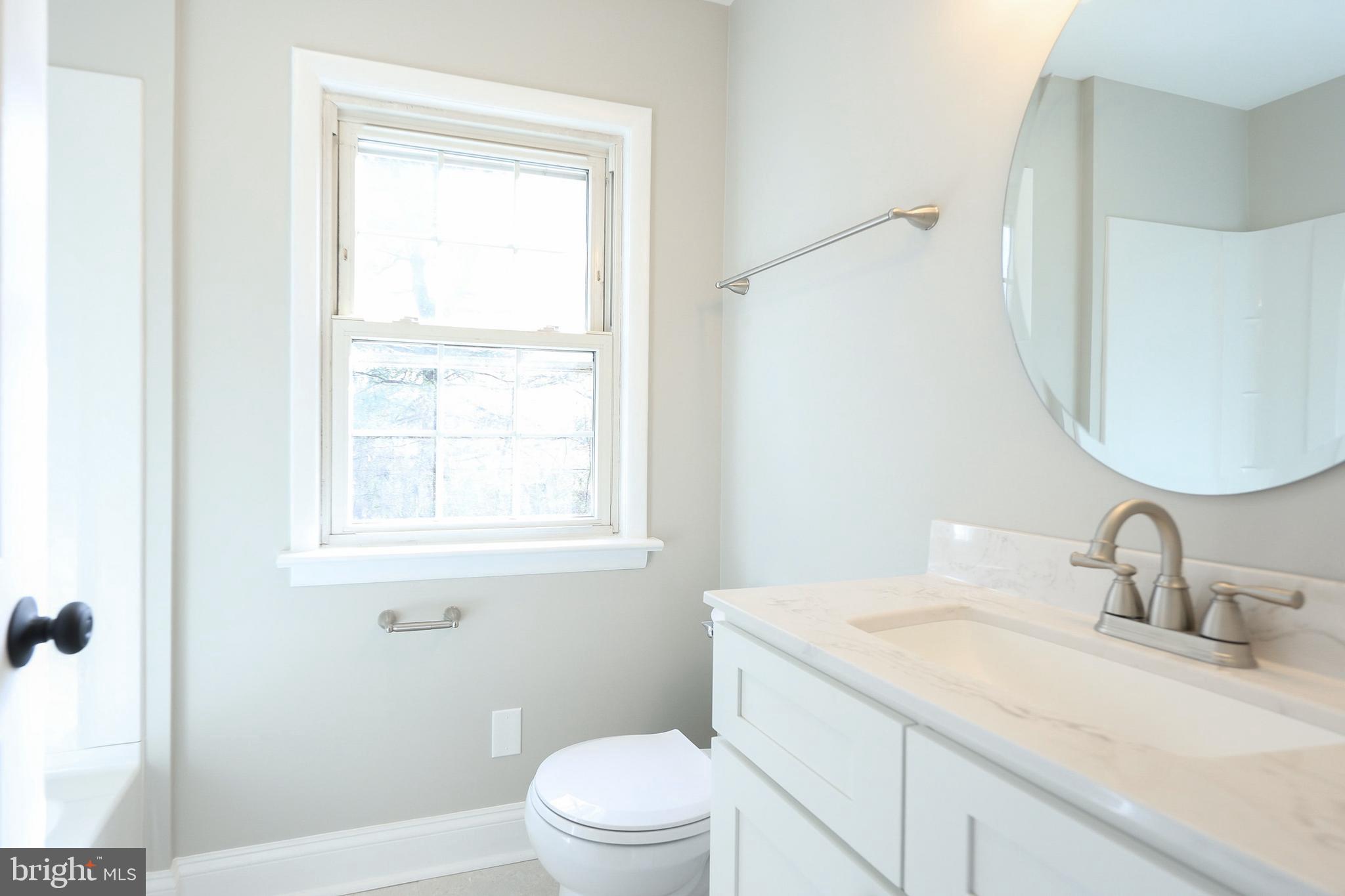 60 Buckwalter Road Royersford, PA 19468 - Photo 19 of 40 a bathroom with a granite countertop sink toilet and shower