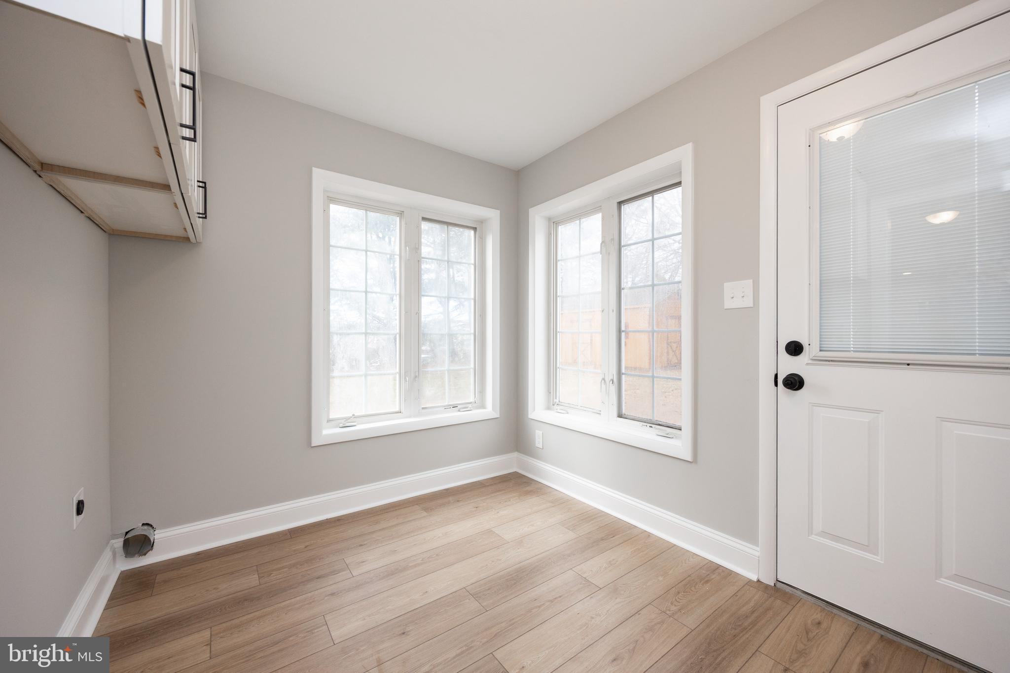 60 Buckwalter Road Royersford, PA 19468 - Photo 20 of 40 a view of an empty room with wooden floor and a window