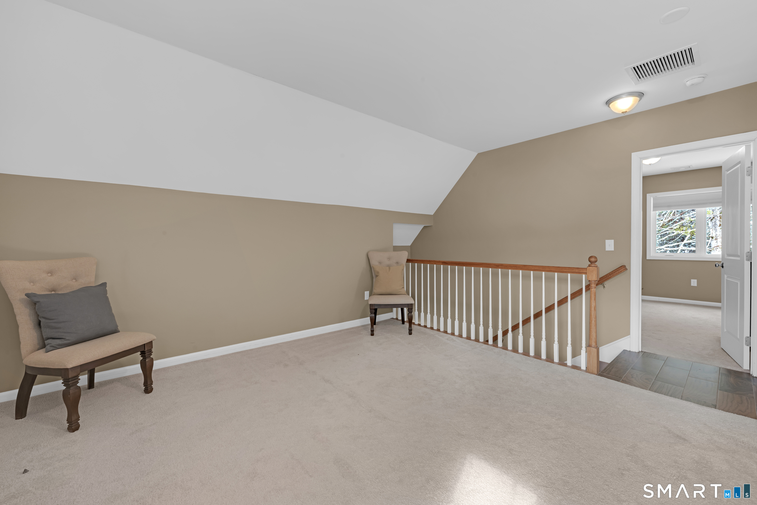 123 Ashford Road, Unit 1 Eastford, CT 06242 - Photo 12 of 23 a view of a room with wooden floor and a bench