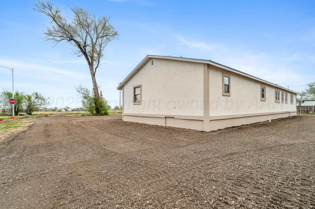 a view of a house with a trees