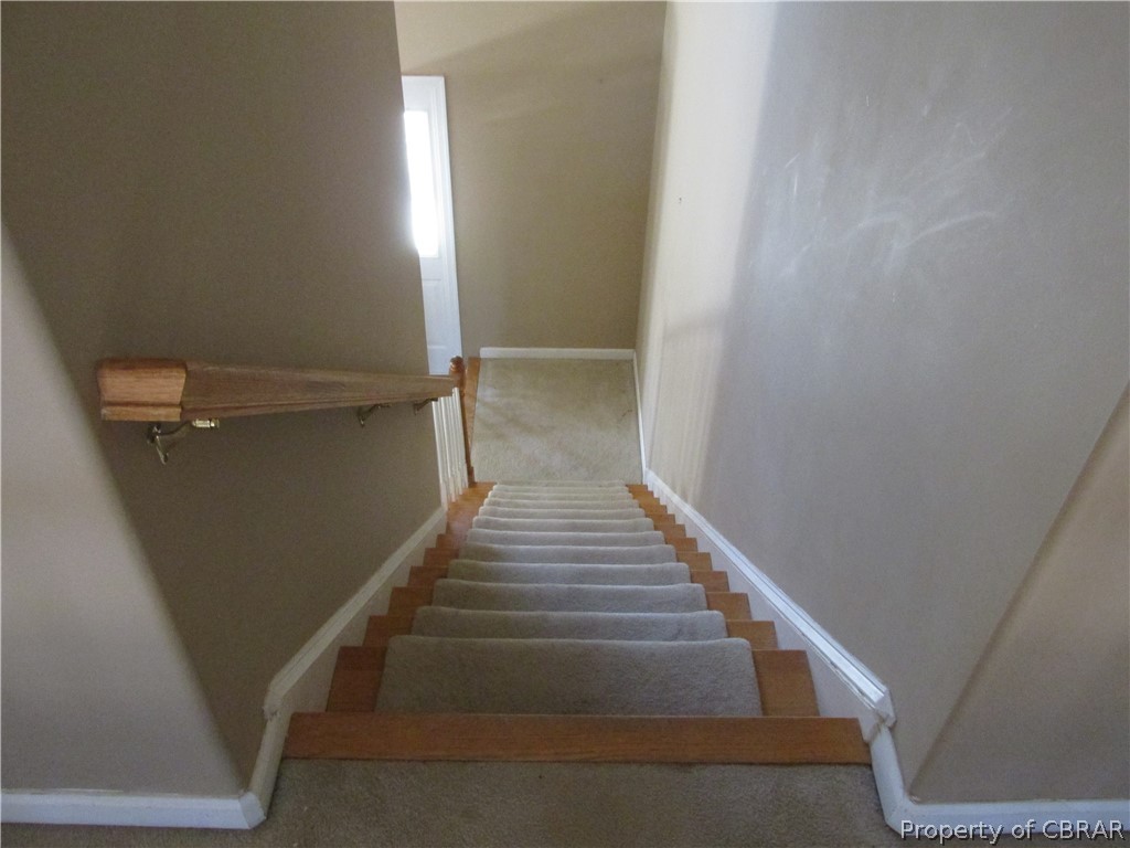 669 Croxtons Road Jamaica, VA 23079 - Photo 28 of 33 A view down the stairway to the roomy base. The stairway is angled for an easy ascent.