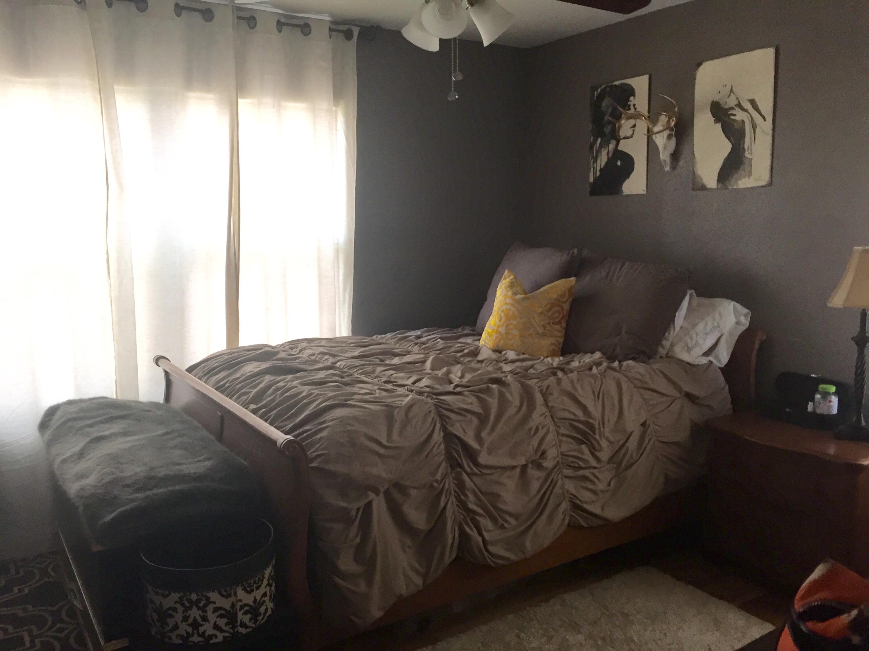 4117 33rd Street Lubbock, TX 79410 - Photo 13 of 14 a bedroom with a bed and a window