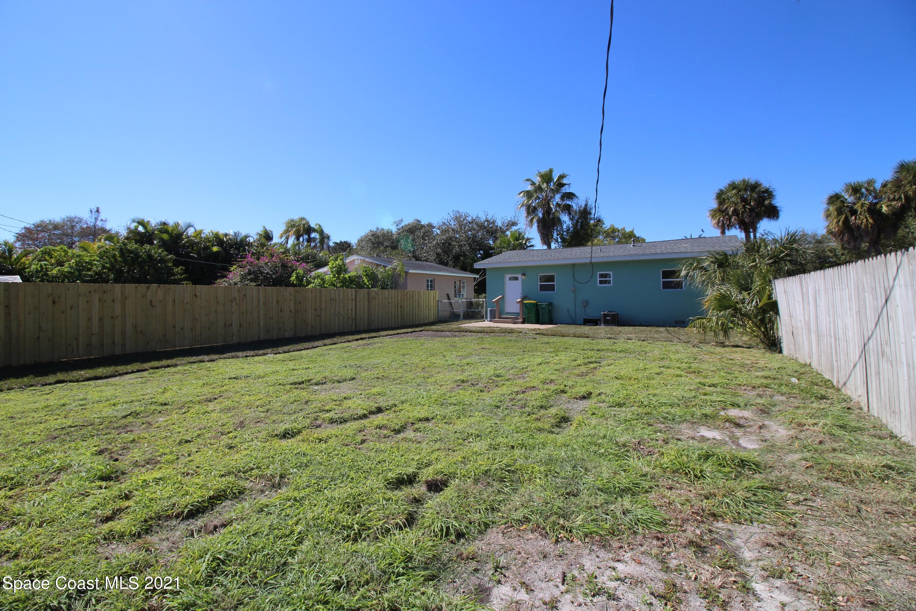 244 North Grove Street Merritt Island, FL 32953 - Photo 20 of 25 a view of a garden