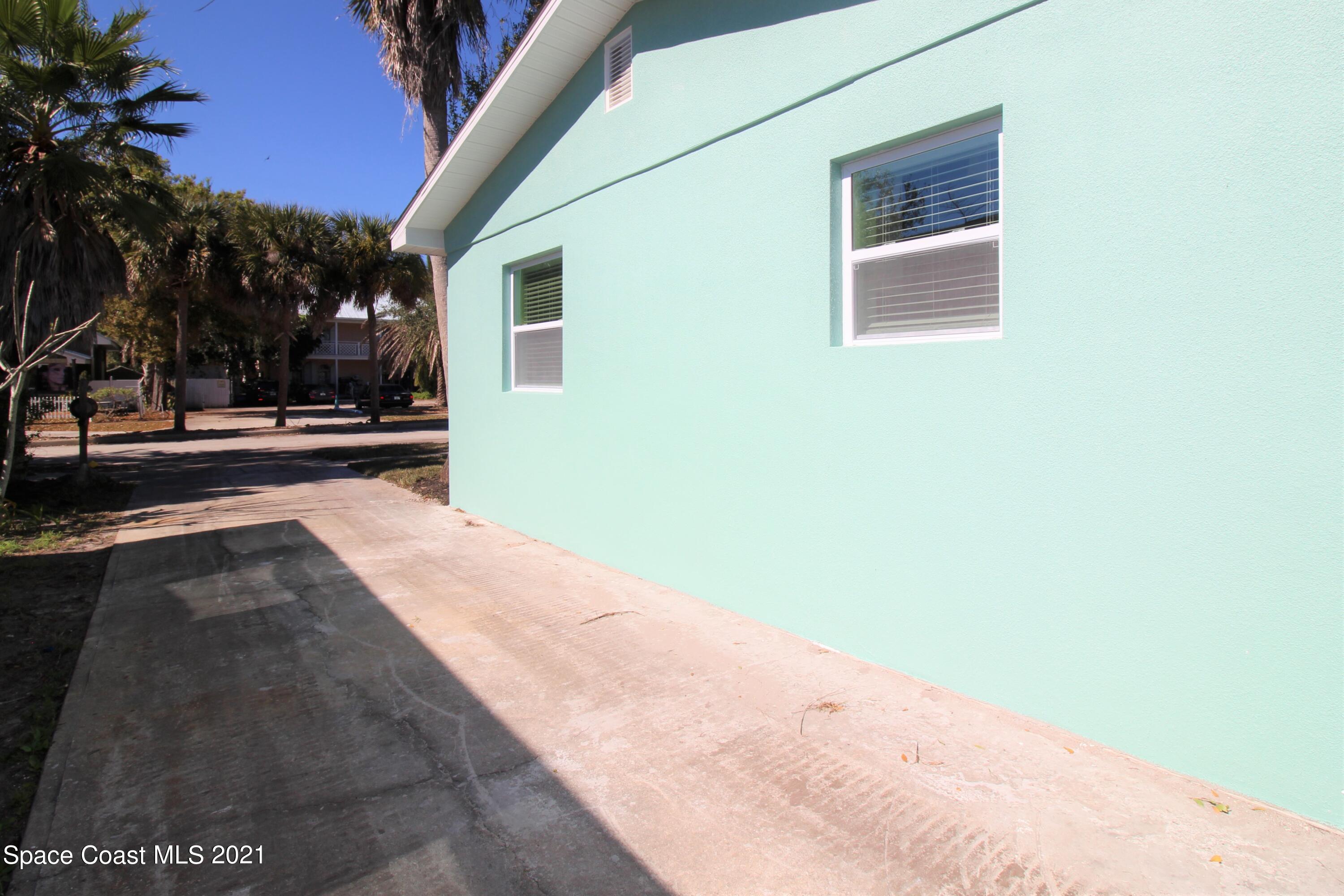 244 North Grove Street Merritt Island, FL 32953 - Photo 23 of 25 a view of a house with a yard