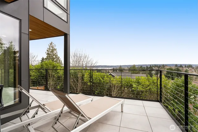 a view of swimming pool from a balcony