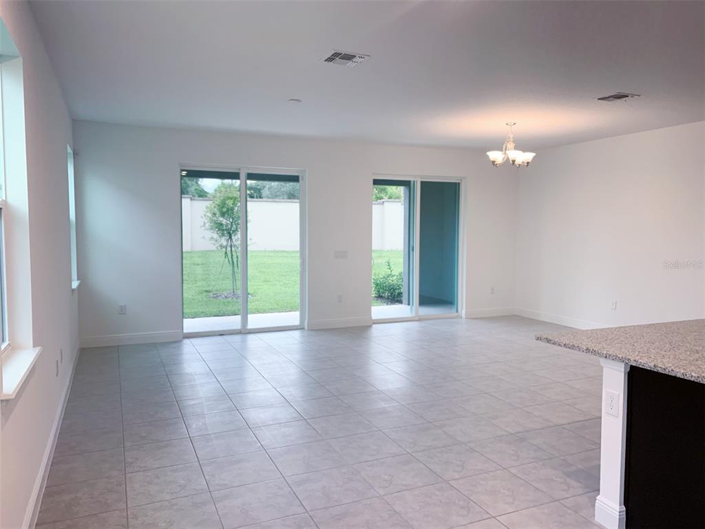 1480 Broad Wing Lane Winter Park, FL 32792 - Photo 5 of 17 a view of an empty room with a window