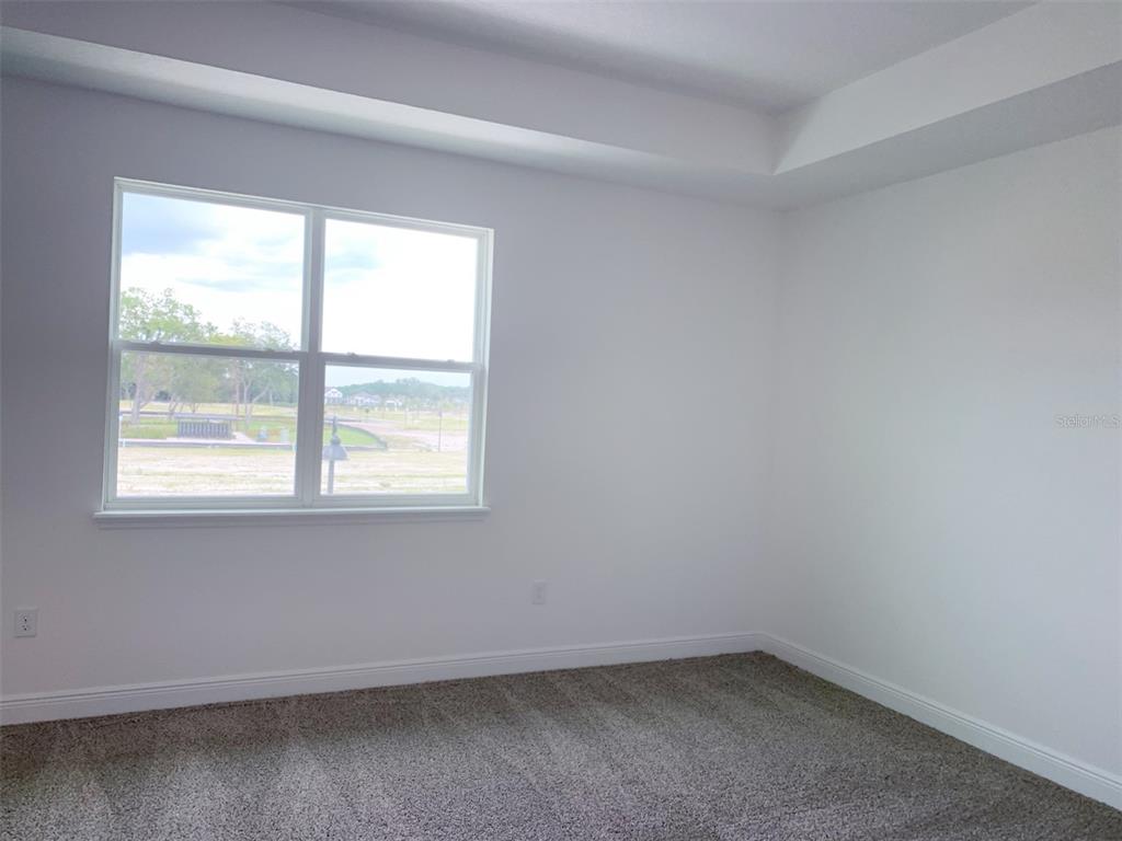 1480 Broad Wing Lane Winter Park, FL 32792 - Photo 10 of 17 an empty room with a window