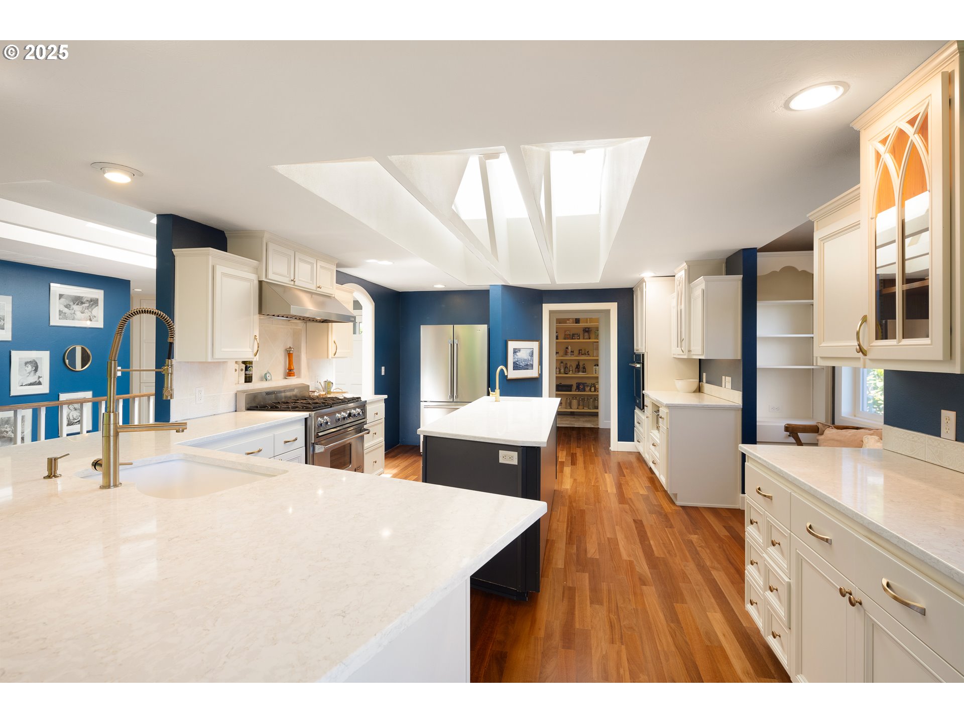 2977 Ingalls Way Eugene, OR 97405 - Photo 12 of 48 a living room with stainless steel appliances kitchen island granite countertop a refrigerator a stove a sink dishwasher with a dining table and chairs with wooden floor