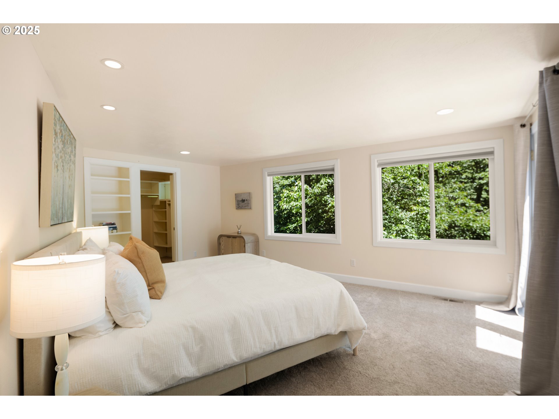 2977 Ingalls Way Eugene, OR 97405 - Photo 27 of 48 a bedroom with a large bed and a large window