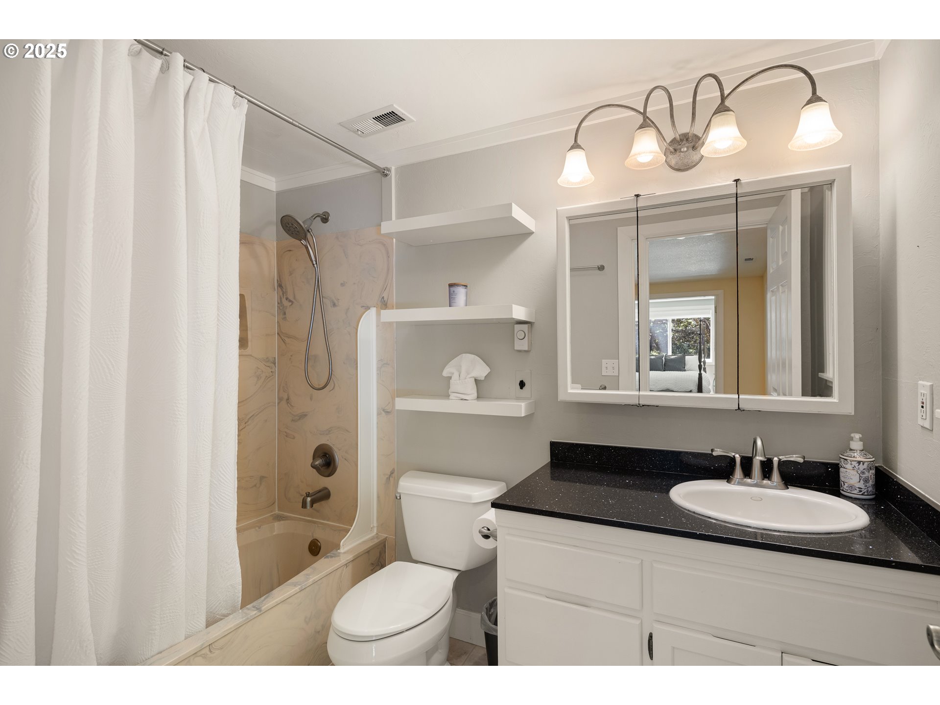 2977 Ingalls Way Eugene, OR 97405 - Photo 32 of 48 a bathroom with a sink a toilet a mirror and shower
