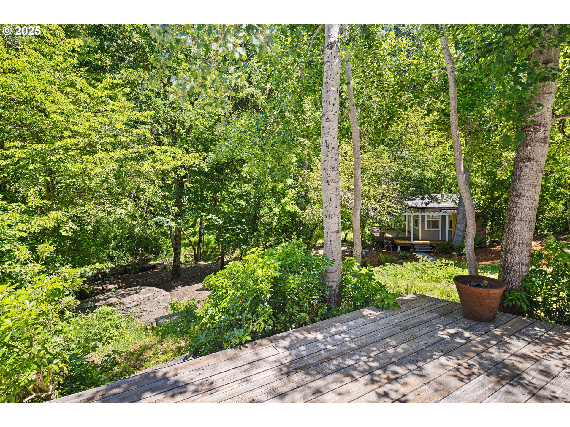2977 Ingalls Way Eugene, OR 97405 - Photo 38 of 48 a backyard of a house with a garden