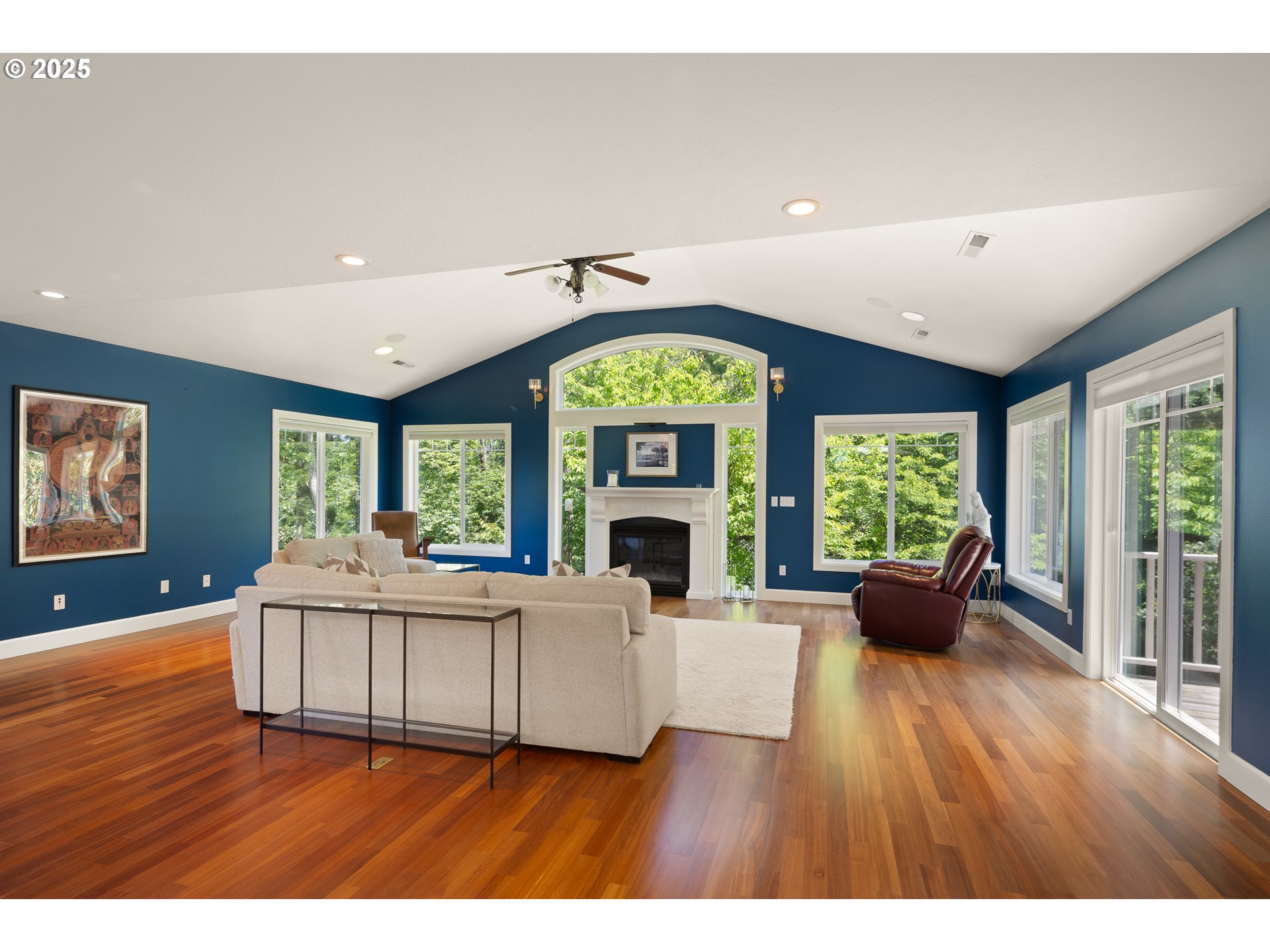 2977 Ingalls Way Eugene, OR 97405 - Photo 6 of 48 a living room with furniture fireplace and large windows