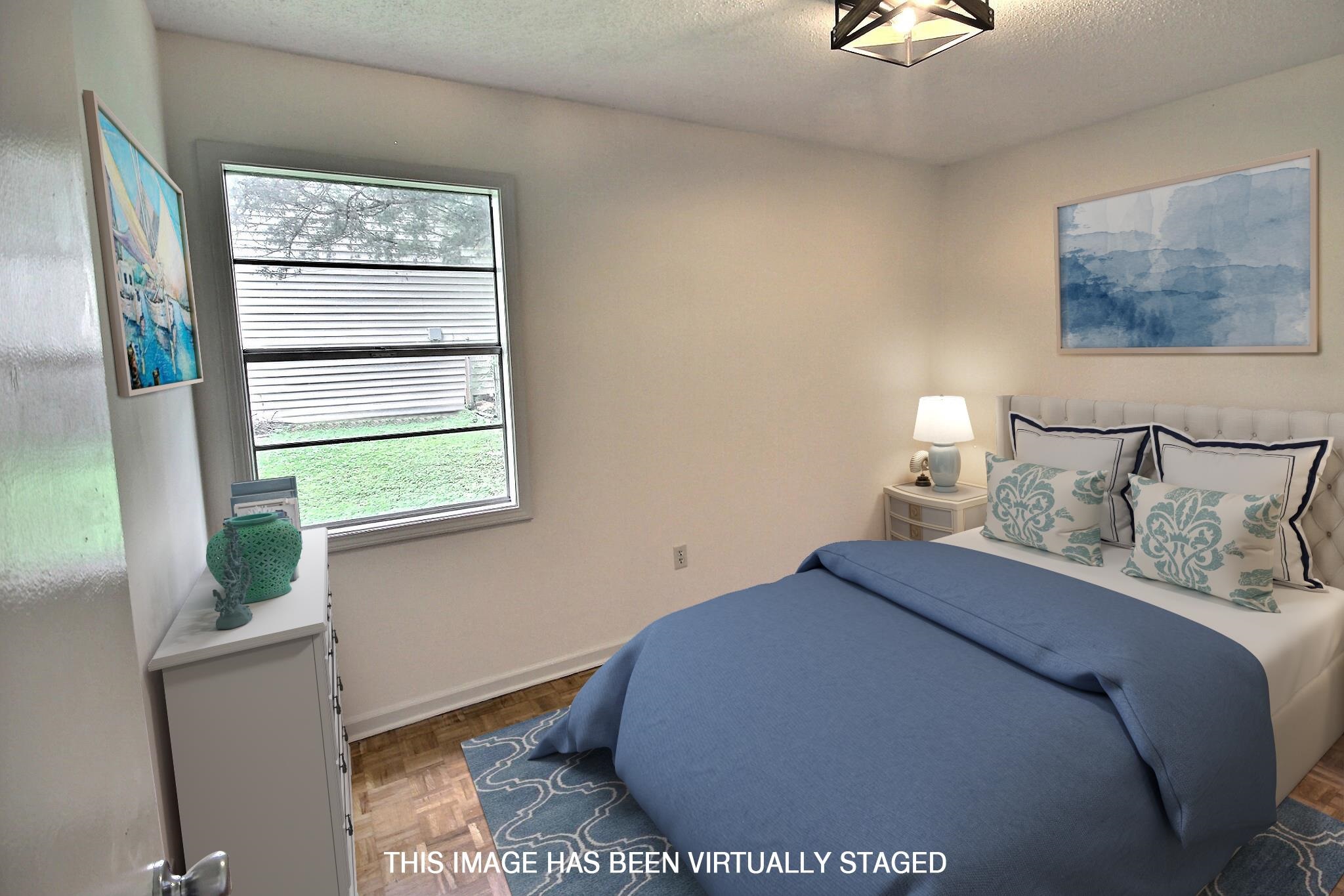 943 Poplar Leaf Road Collierville, TN 38017 - Photo 12 of 17 a bedroom with a bed and a window