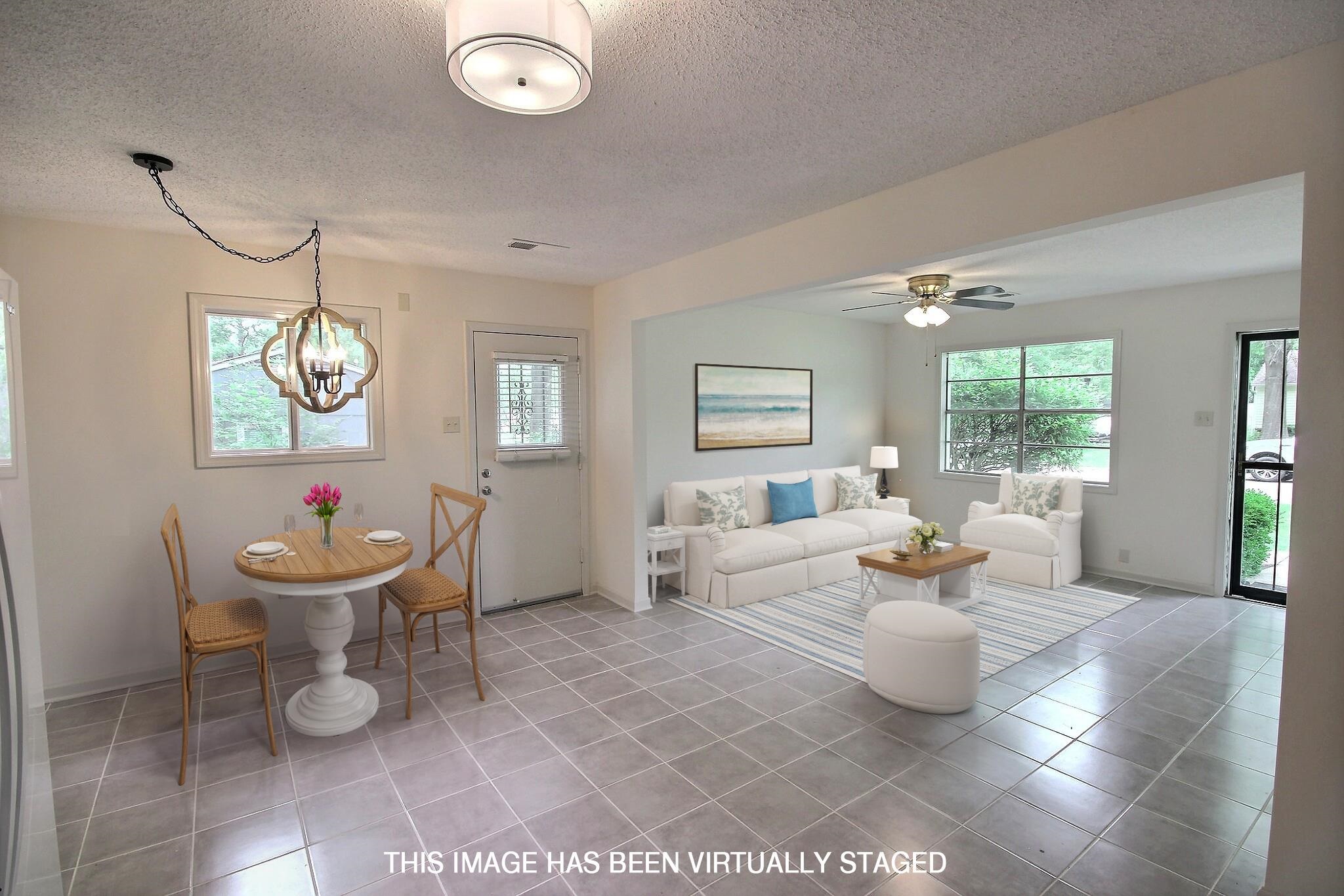 943 Poplar Leaf Road Collierville, TN 38017 - Photo 15 of 17 a living room with furniture a window and wooden floor
