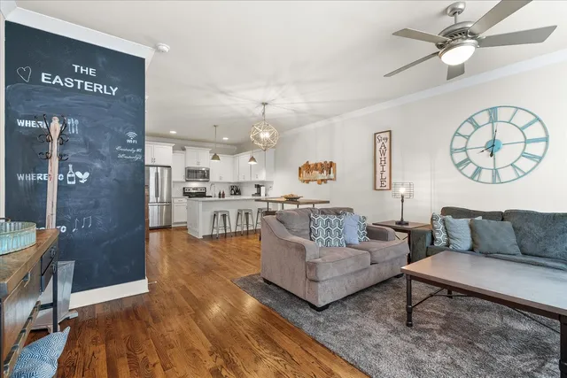a living room with furniture and a table