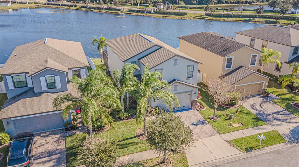 1762 Hadden Hall Place Trinity, FL 34655 - Photo 4 of 39 an aerial view of a house with a lake view