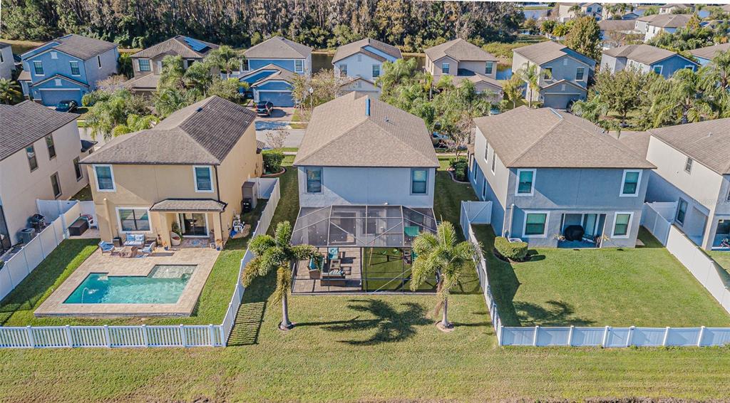 1762 Hadden Hall Place Trinity, FL 34655 - Photo 6 of 39 an aerial view of residential houses with outdoor space and swimming pool
