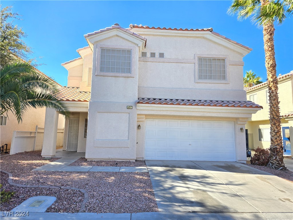 5971 Crumbling Ridge Street Henderson, NV 89011 - Photo 1 of 21
