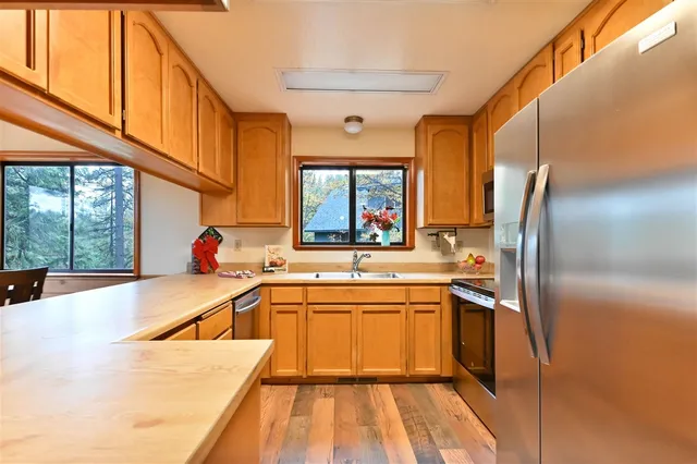 a very nice looking kitchen with a large window