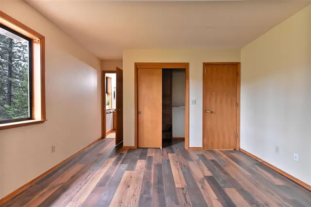 wooden floor and windows in a room