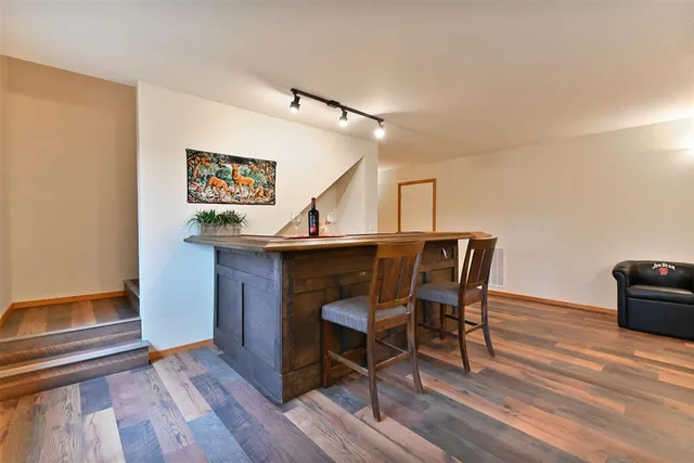 a workspace with wooden floor