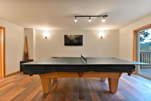 a view of a room with a flat screen tv