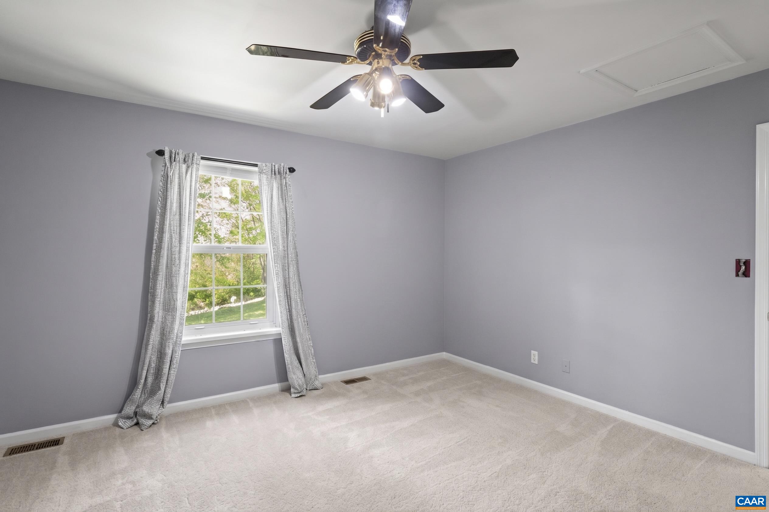 751 Jonquil Road Ruckersville, VA 22968 - Photo 20 of 35 an empty room with a window and a fan