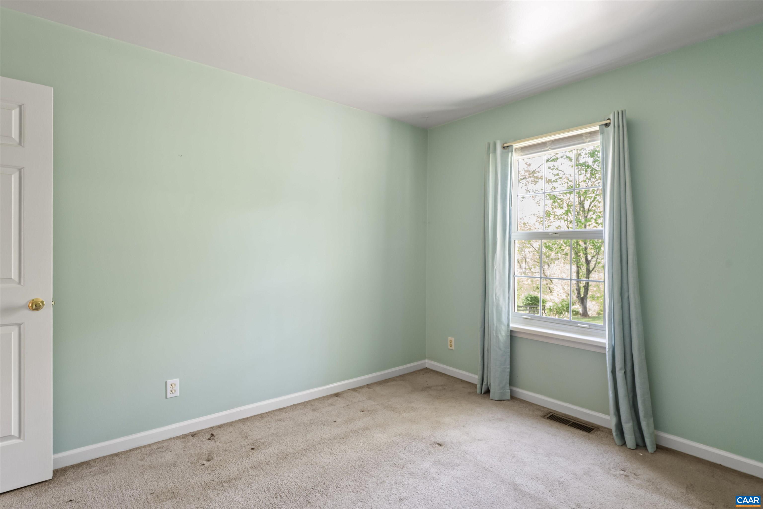 751 Jonquil Road Ruckersville, VA 22968 - Photo 26 of 35 an empty room with windows