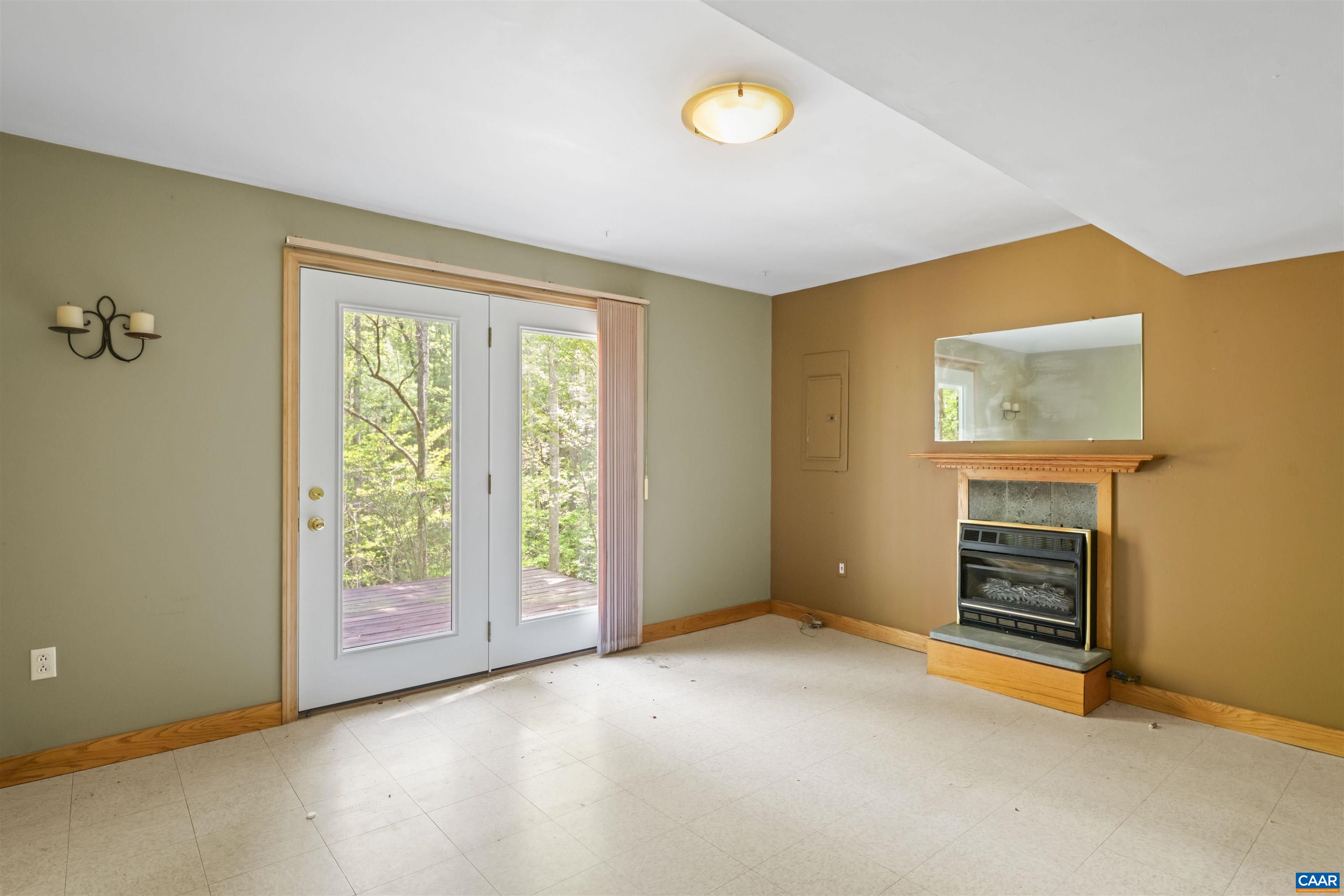 751 Jonquil Road Ruckersville, VA 22968 - Photo 31 of 35 a view of an empty room with a window